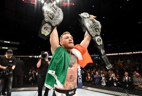 Conor McGregor and his two belts had quite the year. (Getty Images)